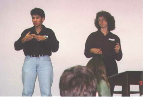 Interpreter on stage with speaker