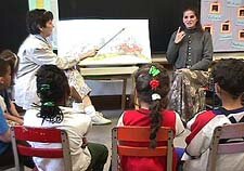 interpreter working with teacher